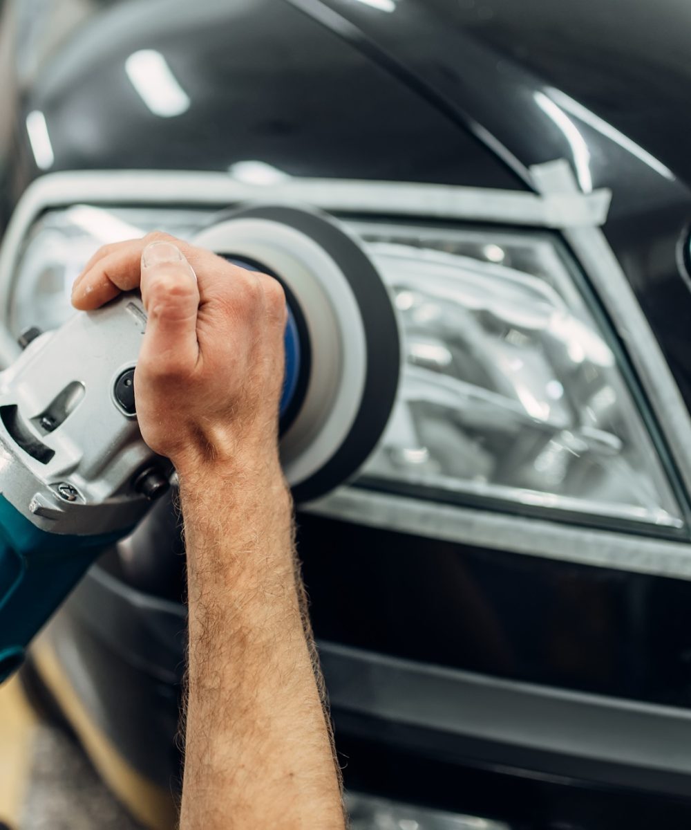 Detailing of car headlights with polishing machine